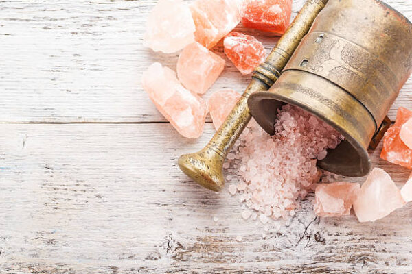 Antique mortar with pink salt