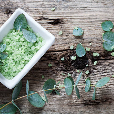 Green bath salt with fresh eucalyptus leaves