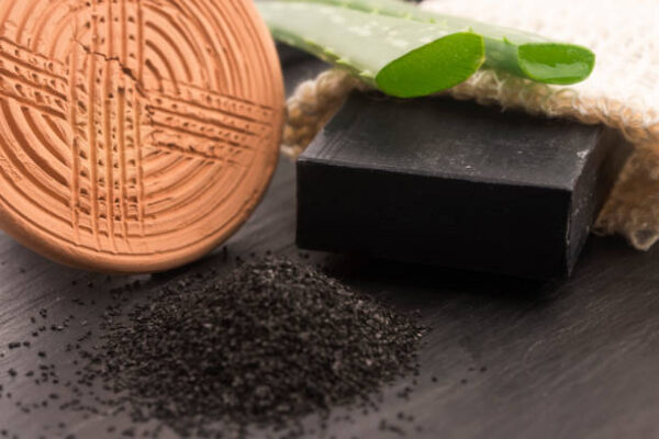 Block of natural carbon soap with aloe vera